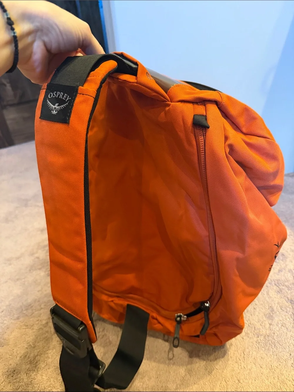 OSPREY Orange Sling Pack with Black Strap
